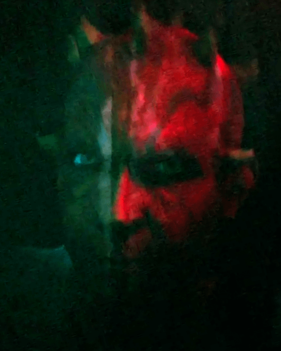 Maul's reflection morphing itself between his younger self and older self.