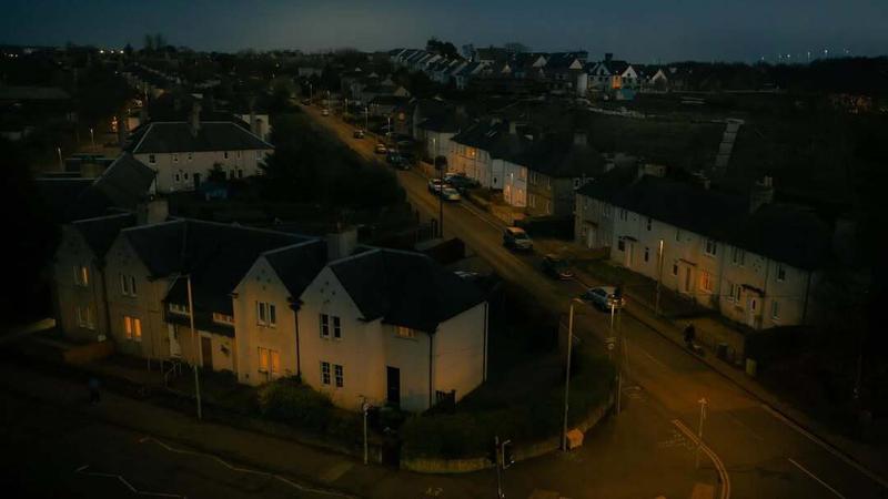 Photo of a residential neighborhood at night by Erik Messerschmidt.