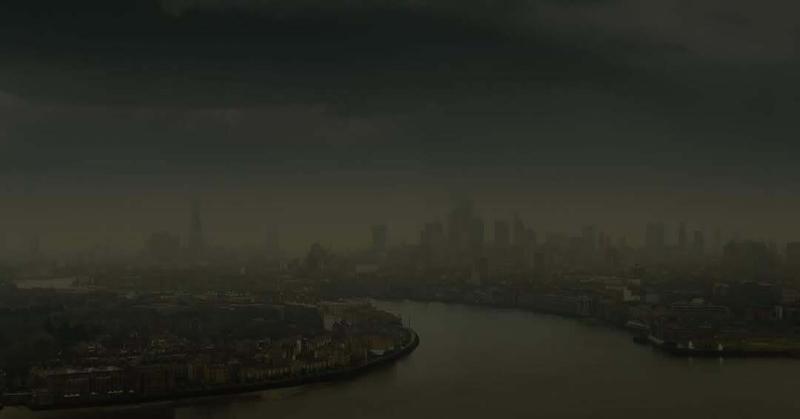A sweeping shot of London city with river Thames carving through it.