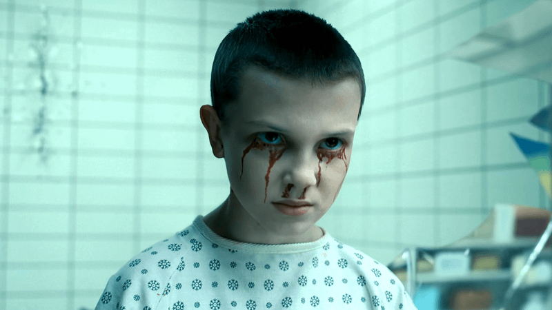 Millie Bobby Brown as Eleven in Stranger Things