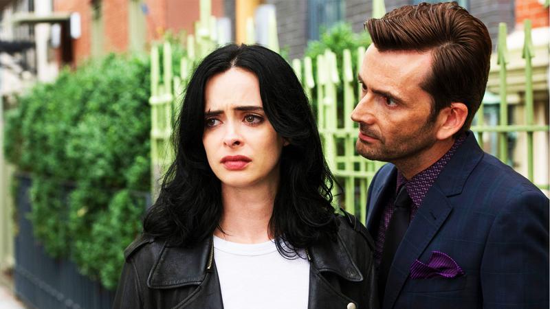 Kilgrave hovering over Jessica Jones.