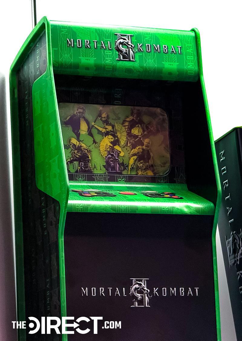 Mortal Kombat 2 Popcorn Bucket, Test Your Might arcade machine tin.