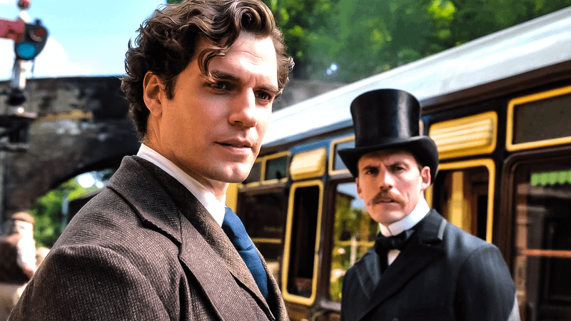 Henry Cavill Sherlock and Sam Claffin Mycroft in Enola Holmes.