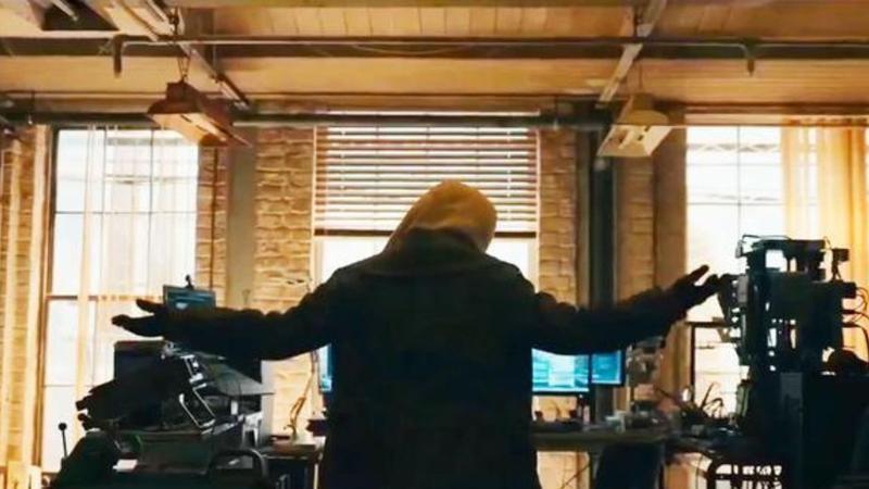 A mysterious character holding their hands up in Spider-Man: Brand New Day.