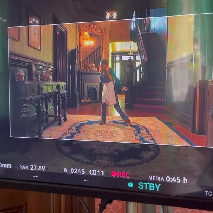 Nell Fisher as Holly Wheeler dancing in the Creel House in Stranger Things