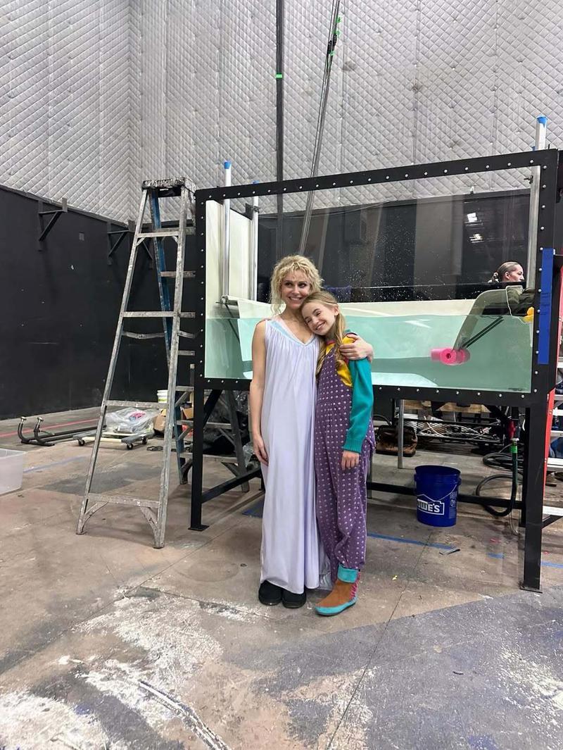 Cara bouno and Nell Fisher standing together on the Stranger Things 5