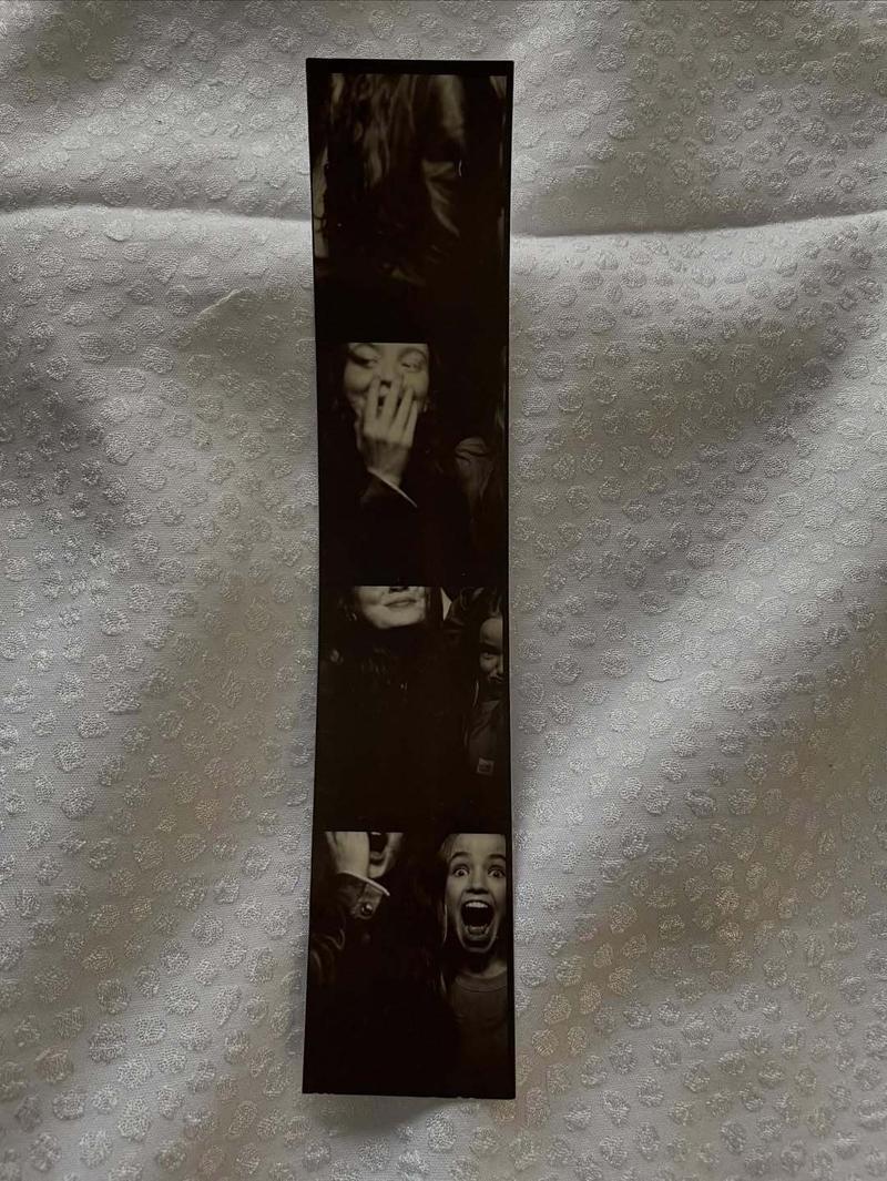 Nell Fisher and Sadie Sink in a film roll of photos on the set of Stranger Things