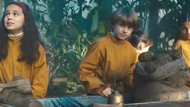 Neville Longbottom smirking in the Harry Potter TV show.