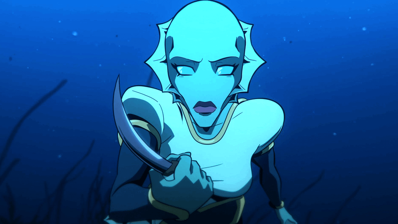 Nina Mazursky wielding a knife underwater.