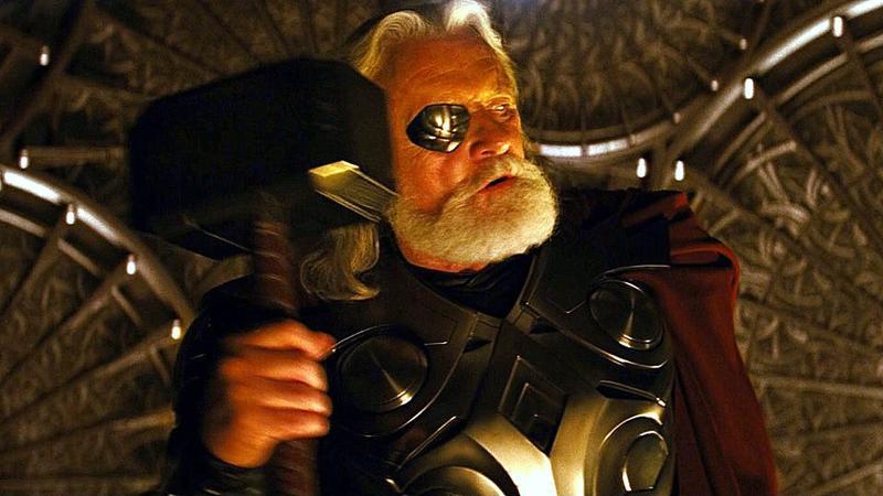 Odin holding Mjolnir in Thor.