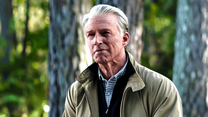 Old Steve Rogers, wearing a beige jacket and gray hair, sits on a bench at the end of Avengers: Endgame.