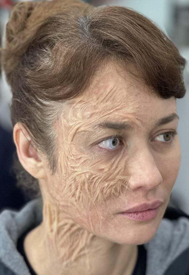Olga Kurylenko with Taskmaster make-up on