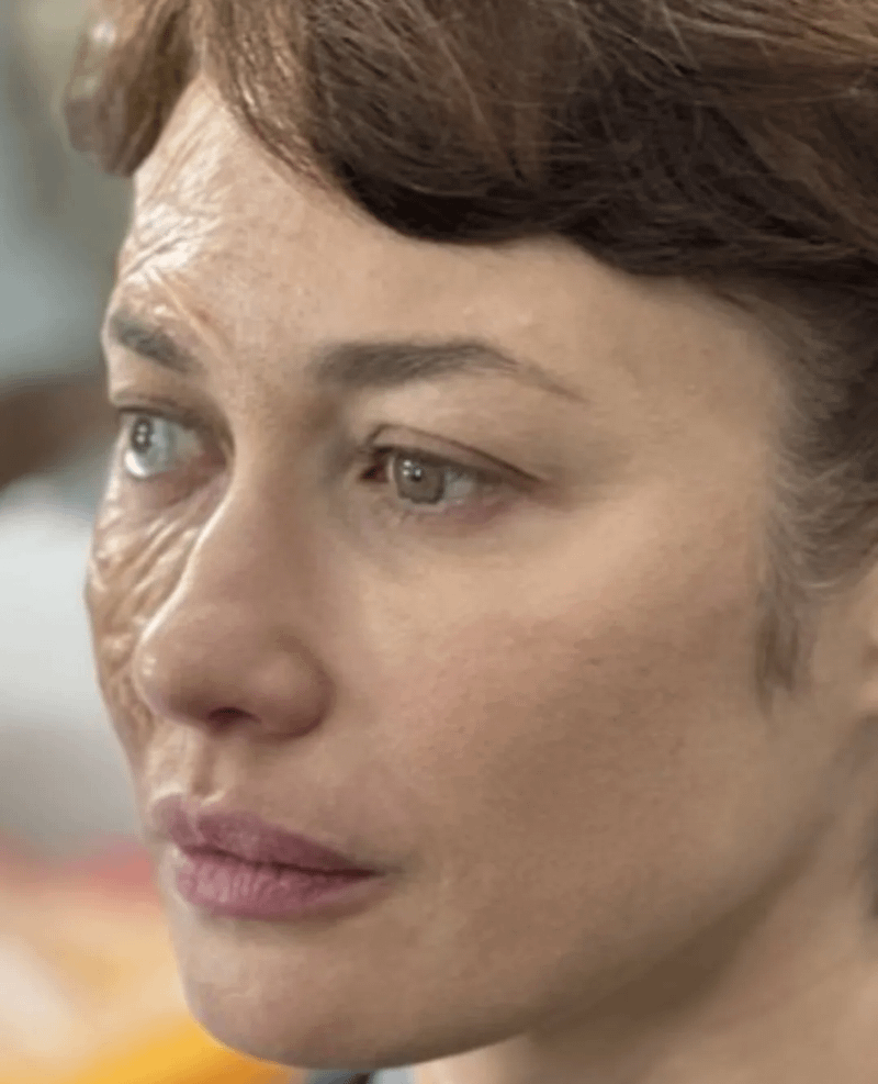 Olga Kurylenko with Taskmaster make-up on