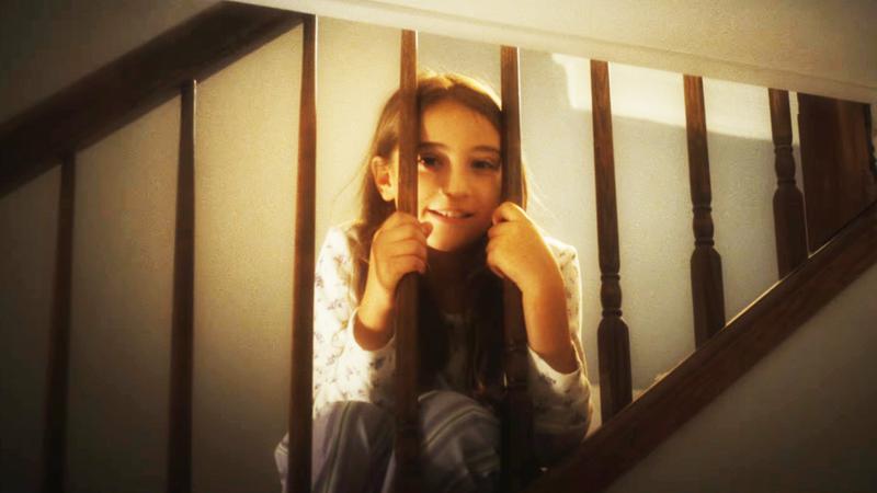 little girl on the stairs in 'The Punisher: One Last Kill.'