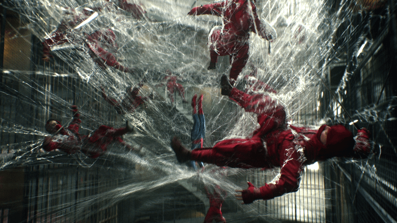 Spider-Man using his organic webs on The Hand.