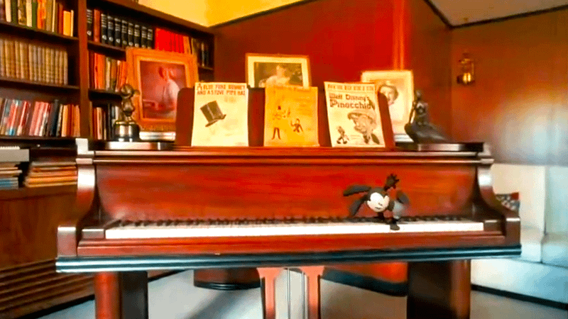 Oswald stepping on piano keys in his new Disney+ series.