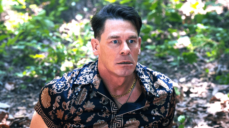 John Cena as Christopher Smith looking shocked in a forest in Peacemaker