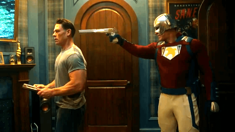 John Cena as Peacemaker standing behind a clone of himself in Peacemaker