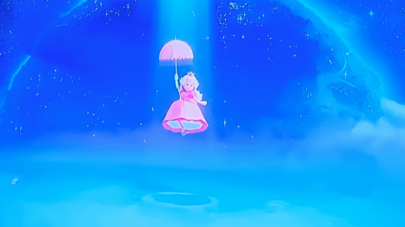 Peach floating using parasol in Super Mario Galaxy Movie Ad For Olympics 2026