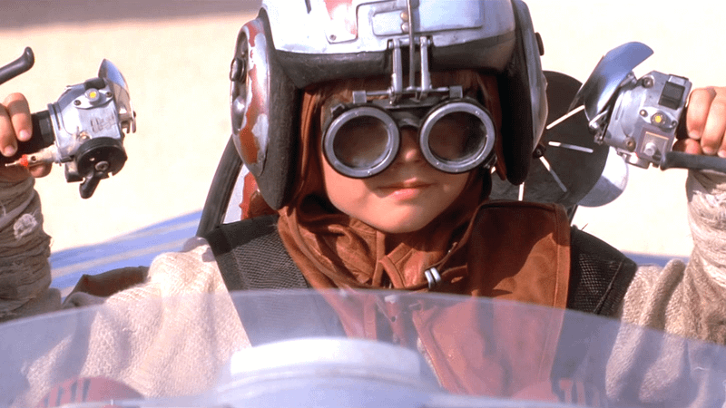 Anakin Skywalker in a podracer.