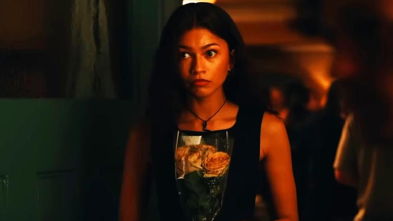 MJ holding flowers from Peter.