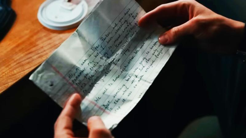 Peter holding the letter he wrote for MJ.