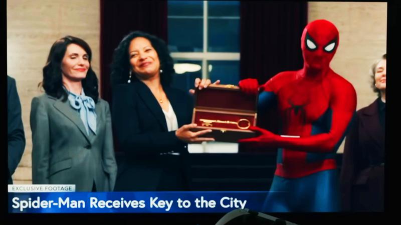 Sheila Riviera and Spider-Man on TV.