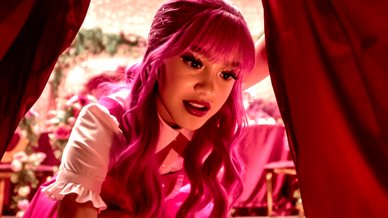 Pink looking under a table in Wicked Wonderland.