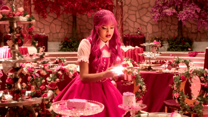 Pink holding a glowing object in her hands.