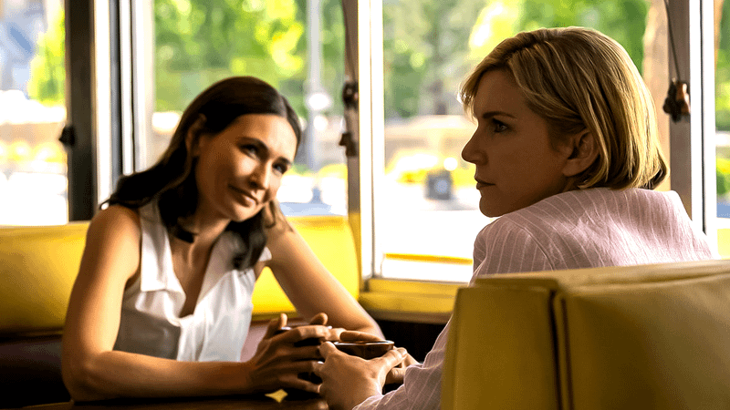 Karolina Wydra as Zosia and Rhea Seehorn as Carol in Pluribus Episode 8
