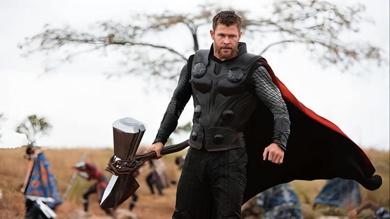 Thor holding his weapon Stormbreaker
