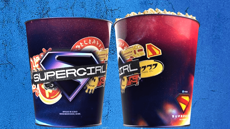 A cool dark purple Supergirl popcorn bucket.