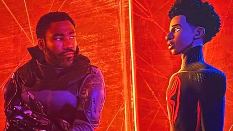 Prowler looking at Miles Morales in Spider-Man: Across the Spider-Verse.