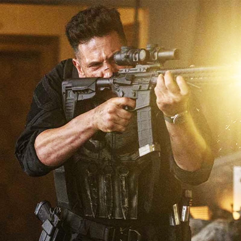 Jon Bernthal as the Punisher shooting a gun in 'Spider-Man; Brand New Day.'
