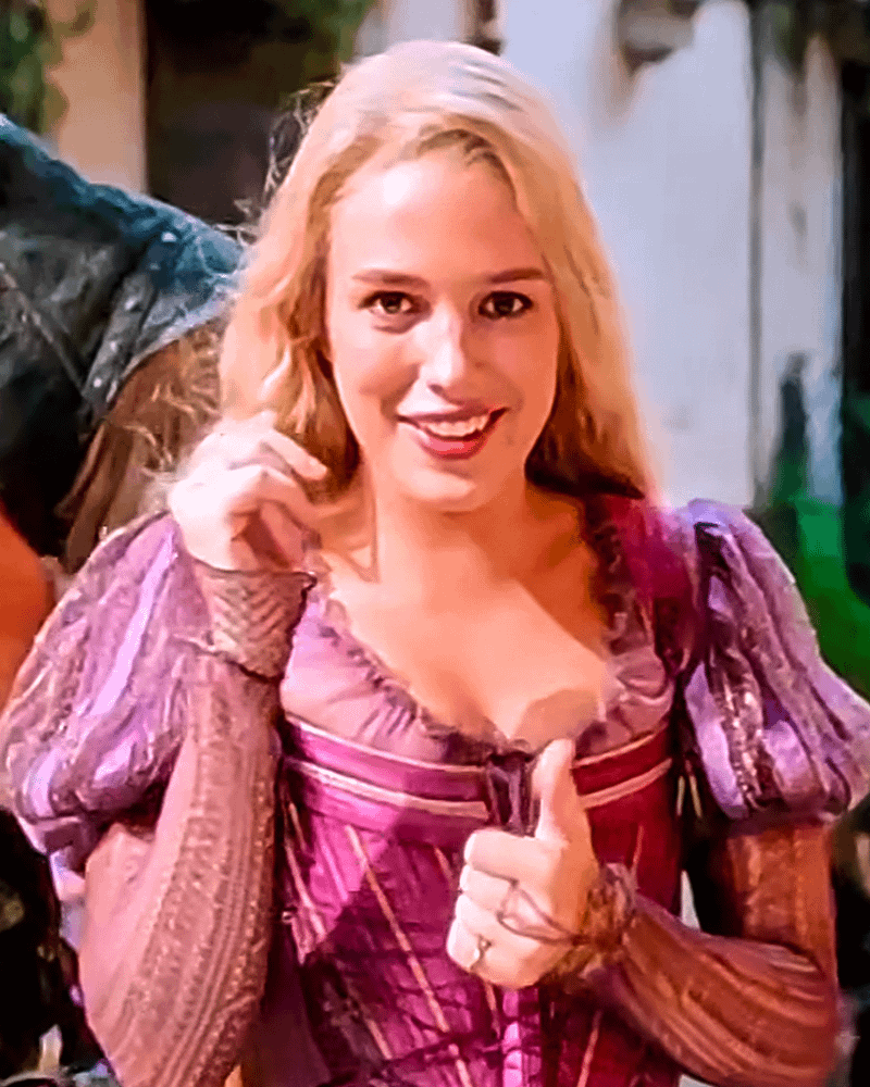 Teagan Croft giving a thumbs-up in her Rapunzel costume.