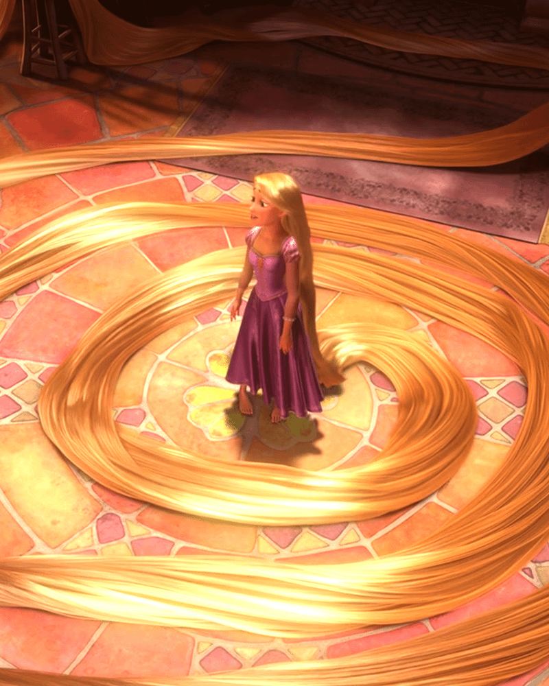 Rapunzel standing in a spiral of her own hair in 'Tangled.'