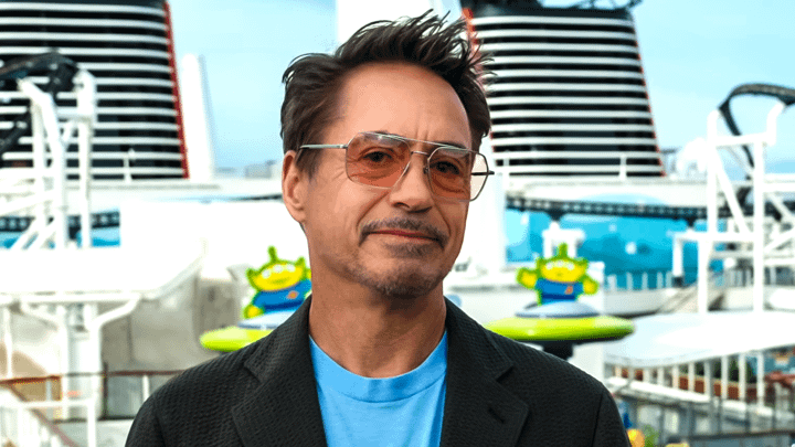 Robert Downey Jr. standing in front of the Disney Adventure.