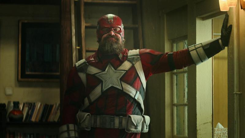 Red Guardian leaning on a wall in Black Widow.