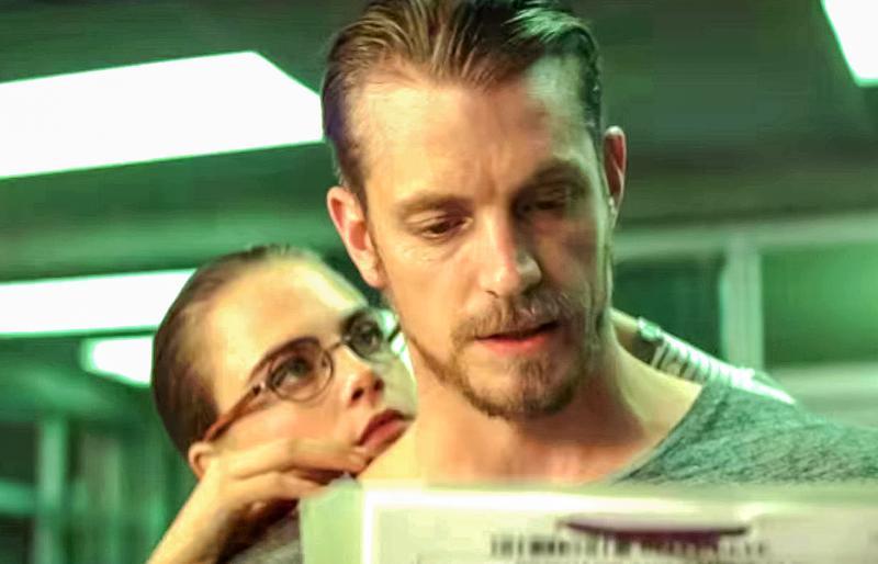 Joel Kinnaman and Cara Delevingne as Rick Flag and Dr. June Moone in Suicide Squad