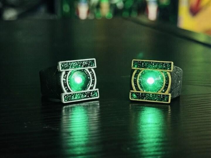 A recreation of John Stewart's ring (left) and Hal Jordan's ring (right).