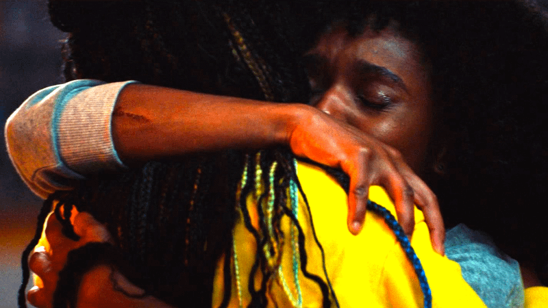 Riri Williams hugging Natalie, Ironheart