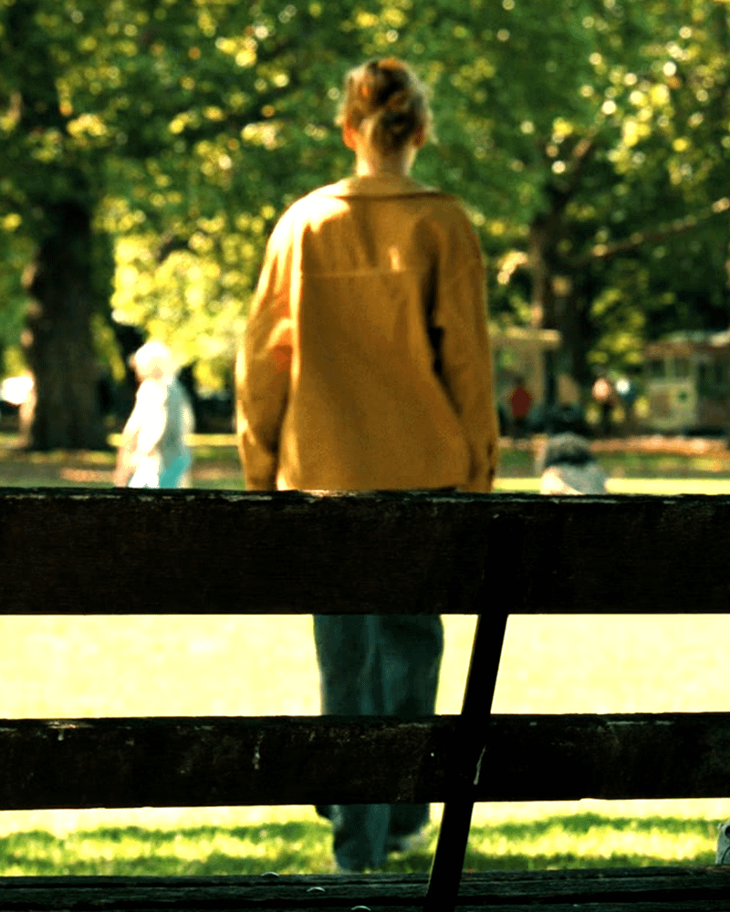 Sara Grey walking in the park.