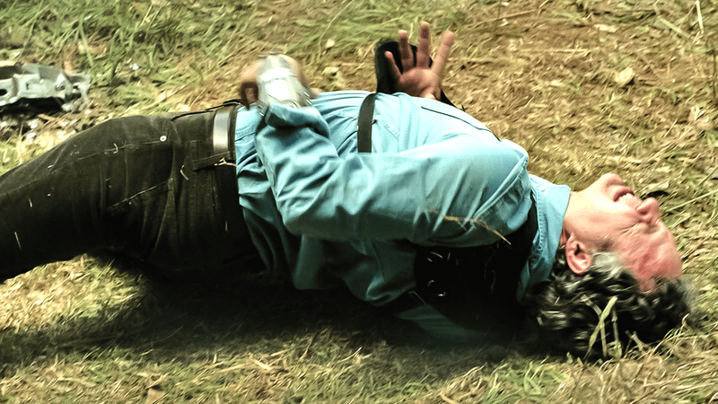 Bruce Banner wincing in pain after an accident in She-Hulk.