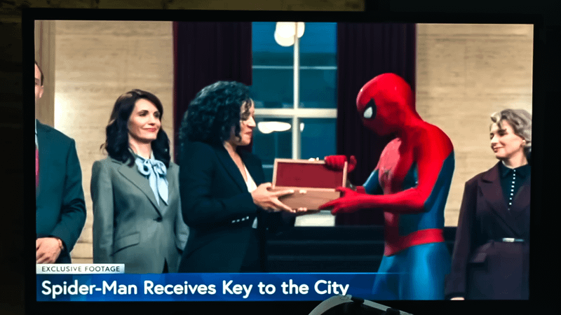Spider-Man receiving the Key to the City in the Spider-Man: Brand New Day trailer from Sheila Rivera.