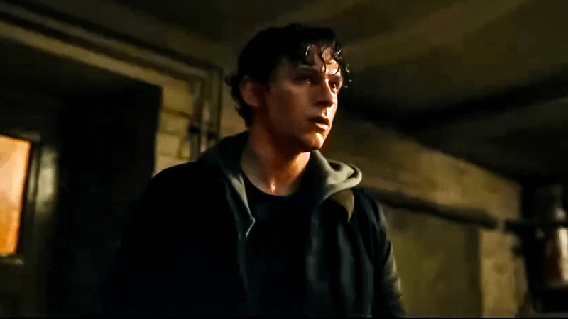 Tom Holland as Peter Parker about to fall over.