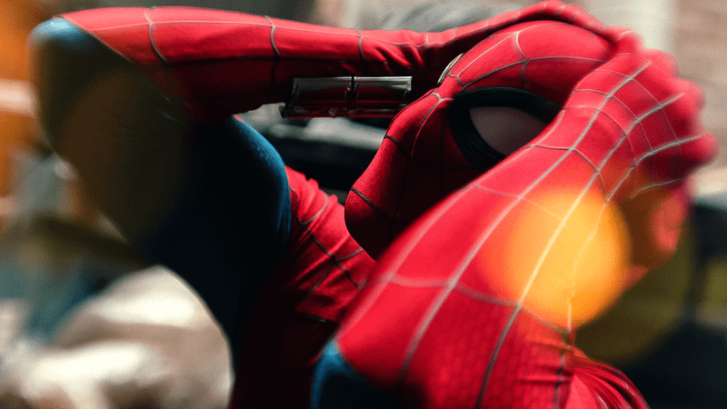Tom Holland's Spider-Man clutching his head in Spider-Man Brand New Day.