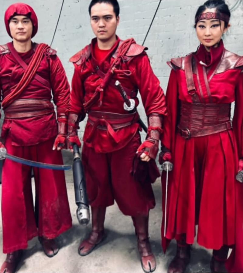 Fan Xiaoshuang and actors playing The Hand warriors in Spider-Man: Brand New Day.