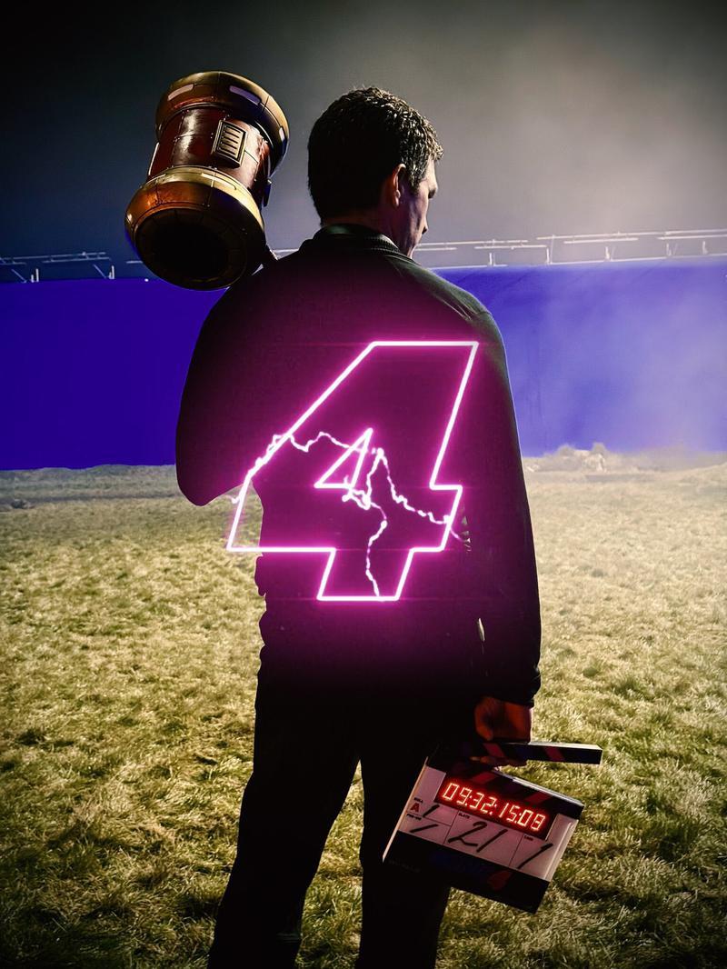 Sonic the Hedgehog 4 logo with Jeff Fowler on Sonic 4 set.