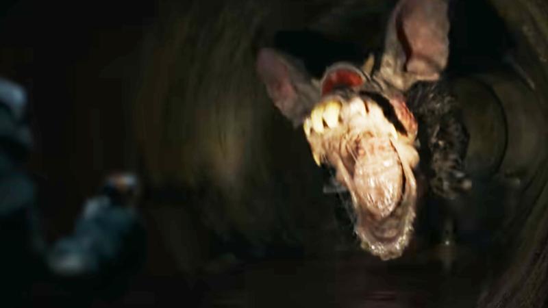 A sewer rat opening its mouth and screaming at Grogu.