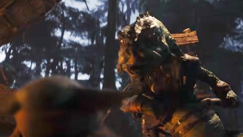 An unknown alien character looking at Grogu.